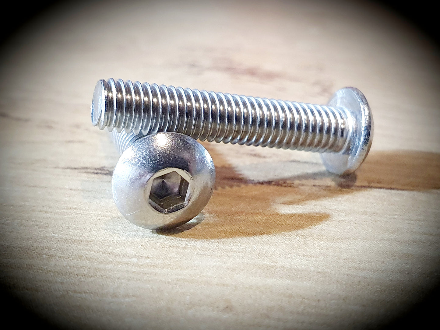 Screw with flattened half round head and hexagon socket M5 X 25