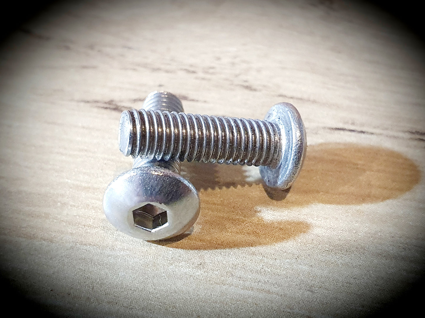 Screw with flattened half round head and hexagon socket M5 X 16